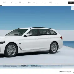Białe BMW 530e Touring, hybryda, z automatyczną skrzynią biegów. Eleganckie i dynamiczne auto.
